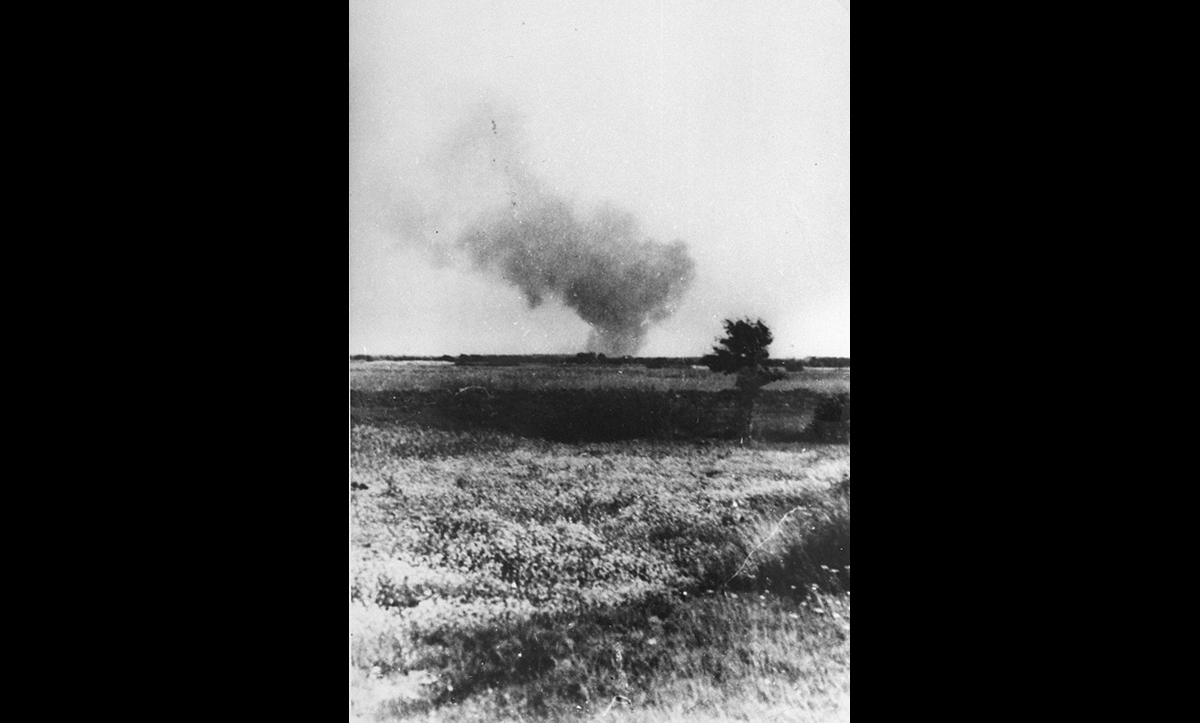 Smoke over Treblinka extermination camp after part of the camp was set ablaze during the camp uprising on 2 August 1943, captured by a railway worker.