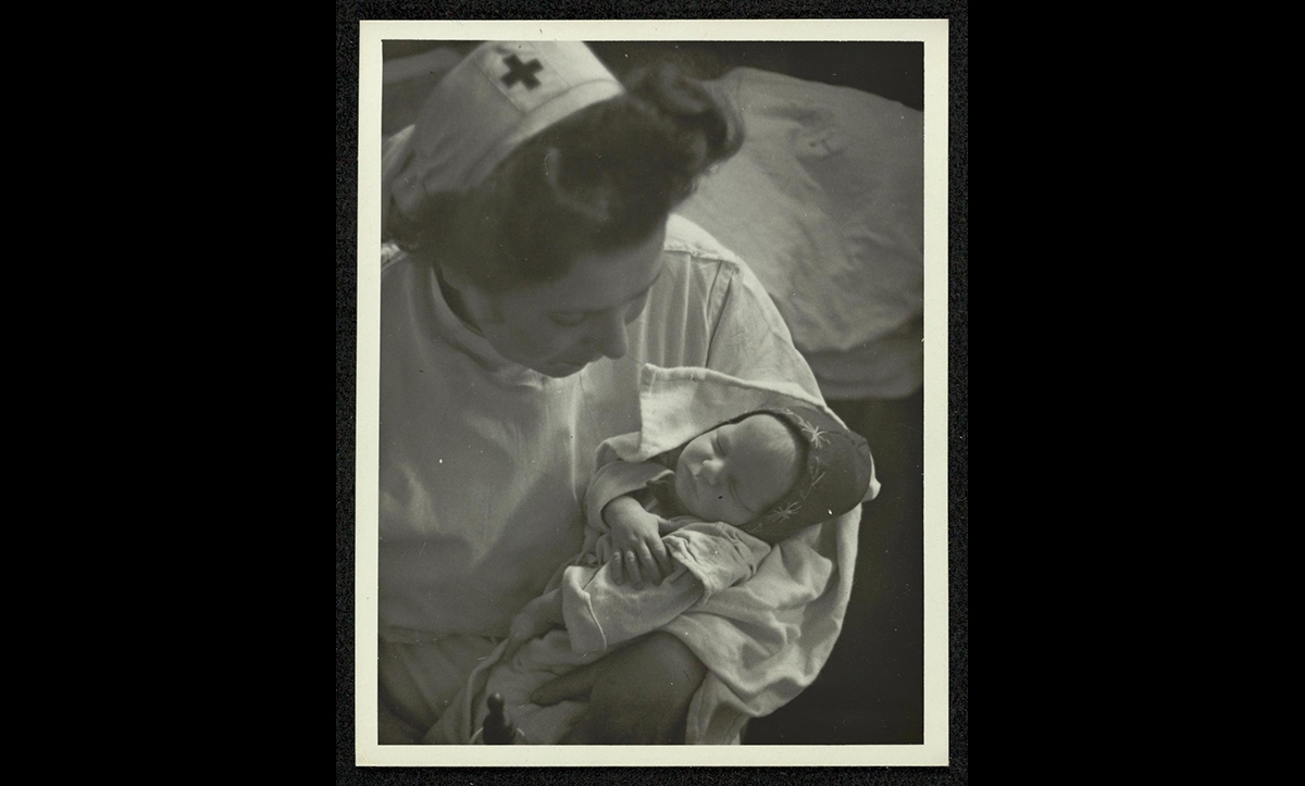 This photo shows one of the many babies that were born in the camp. Many survivors got married and started families in the DP camps. By July 1947, there had been 1,070 marriages held in Belsen and around 15 babies were born each week. In February 1948, the 1,000th baby was born. 